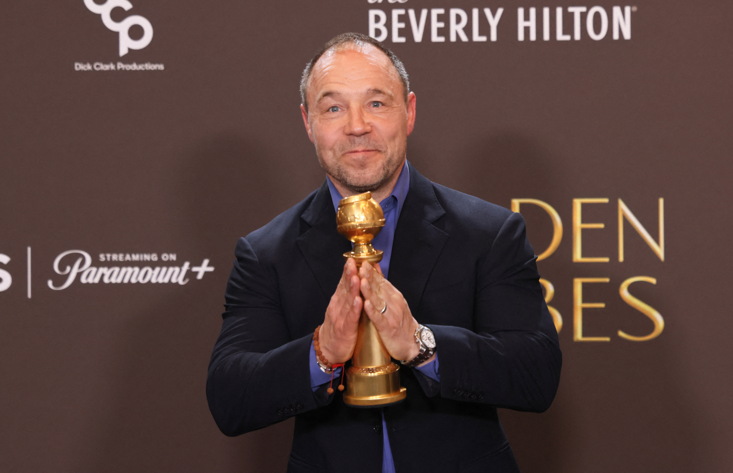 ގޯލްޑެން ގްލޯބްސް 2026: ގޯލްޑެން ގްލޯބްސް އެވޯޑުގެ ރެޑްކާޕެޓުގައި އިނގިރޭސި އެކްޓަރު ސްޓީވެން ގްރަހަމް.-- ފޮޓޯ: އޭއެފްޕީ