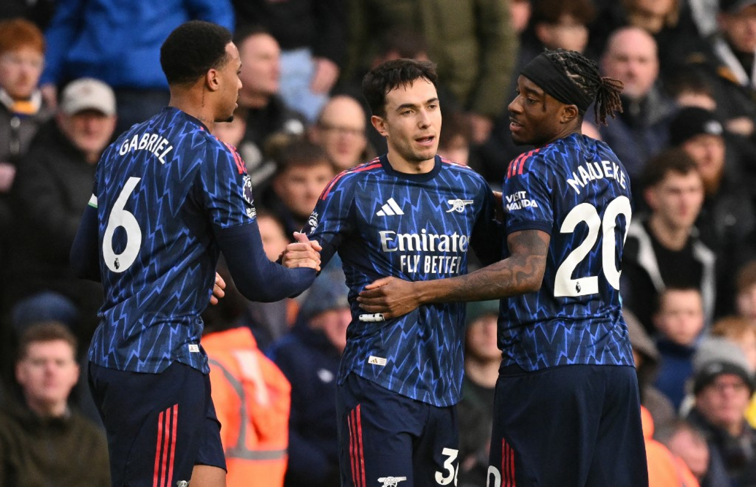 އާސެނަލްގެ ކުޅުންތެރިން ގޯލެއް ޖެހުމަށް ފަހު.-- ފޮޓޯ: އޭއެފްޕީ