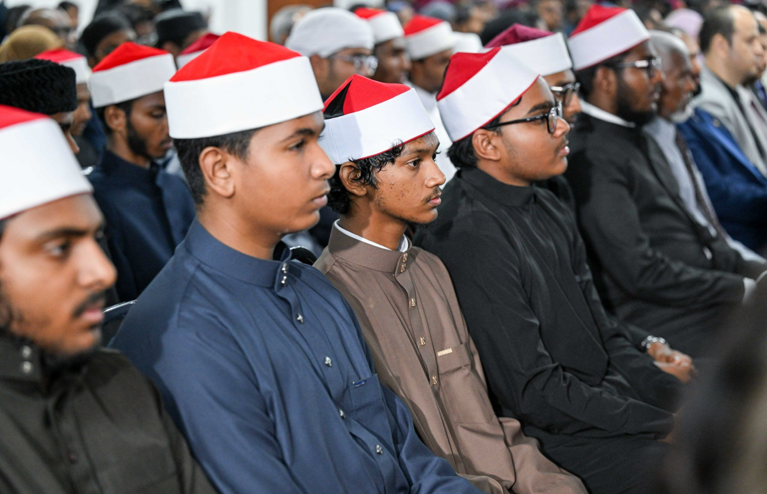 ކީރިތި ގުރުއާން ކިޔެވުމުގެ ގައުމީ މުބާރާތް ނިންމުމުގެ ރަސްމިއްޔާތުގައި ބައިވެރިވި ބައެއް ކުދިން.---ފޮޓޯ: ރައީސް އޮފީސް